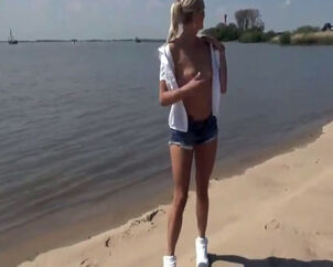 Slender german ash-blonde get penetrated at the sea beach