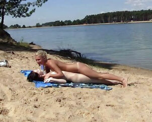2 torrid russian teen getting a suntan on the free beach...