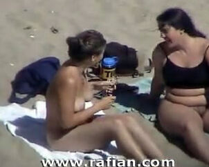 Oral intercourse on bare beach from hidden cam camera